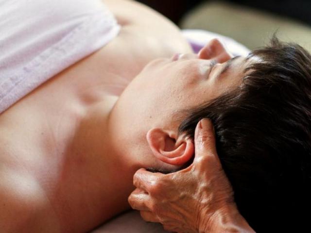 Image: massage therapist with patient.